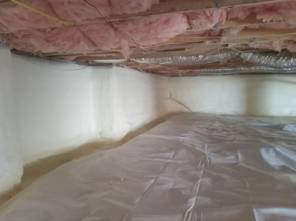 Crawl space encapsulation with closed-cell spray foam for Commercial Roof Restoration in West Pleasant View